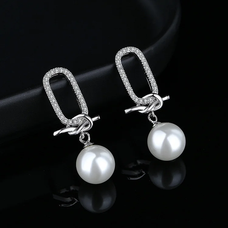 Casual White Pearl Bow Diamond Dangle Earrings  Flycurvy [product_label]