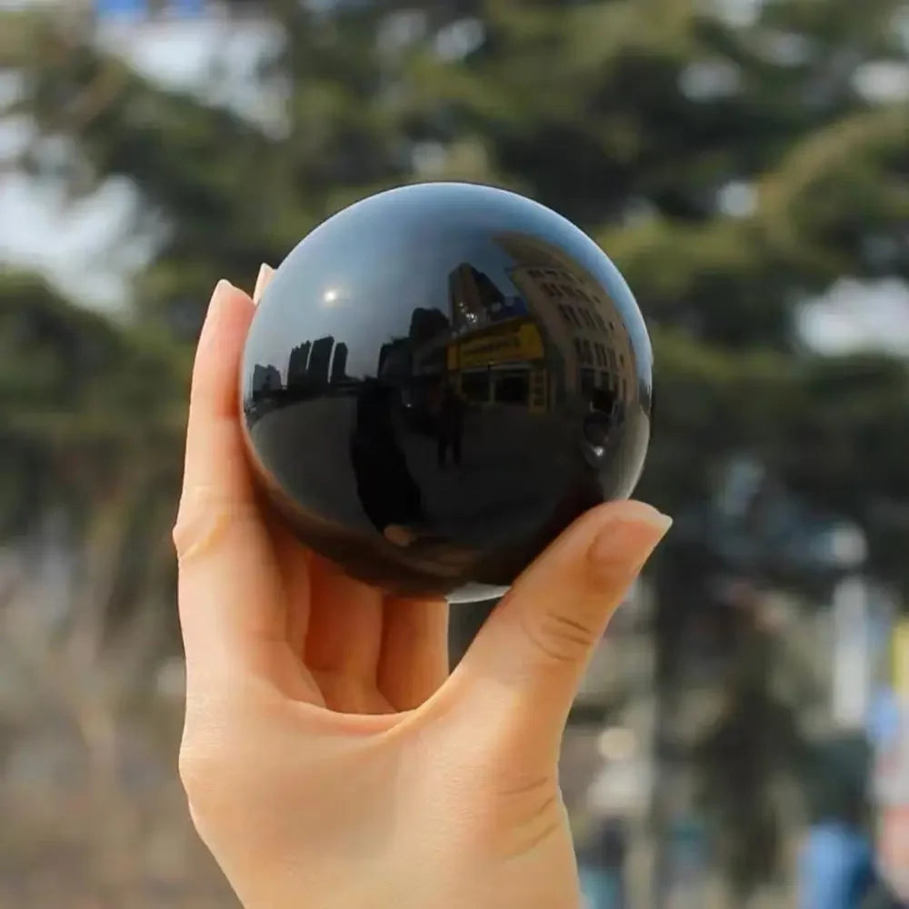 Obsidian sphere close-up showing glossy polish