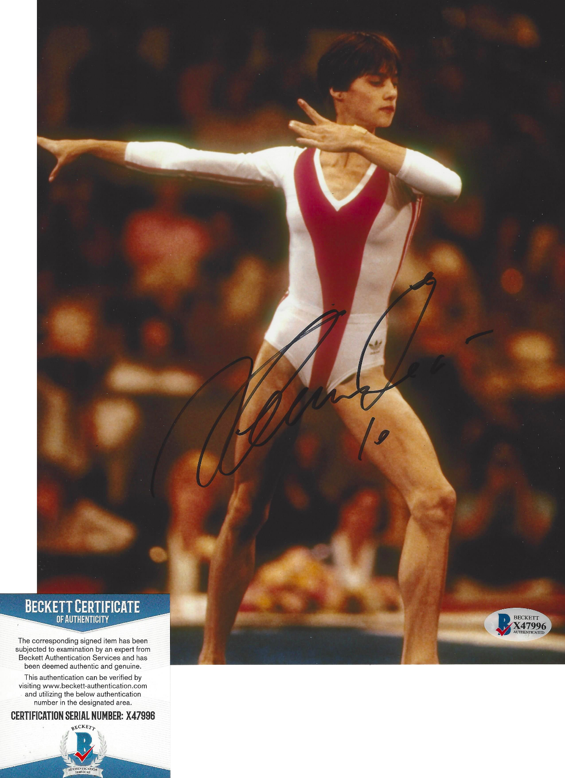 GYMNAST NADIA COMANECI SIGNED OLYMPIC GOLD MEDAL SIGNED 8X10 Photo Poster painting 3 BECKETT COA