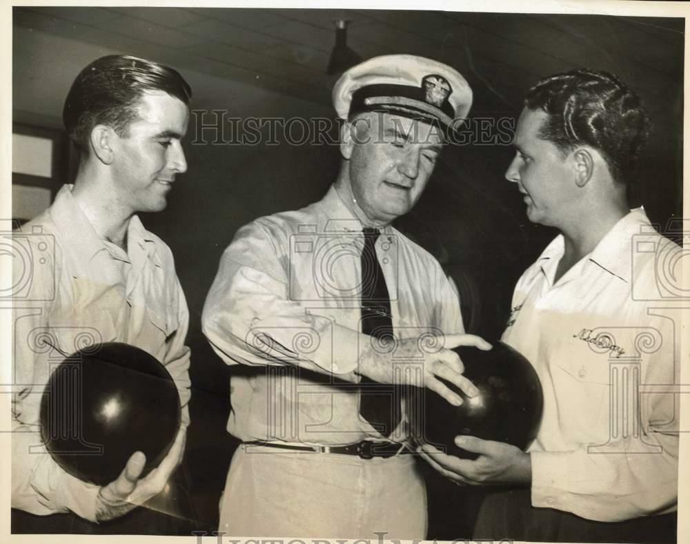 Press Photo Poster painting Military Officer with Two Men Bowling - sba31346