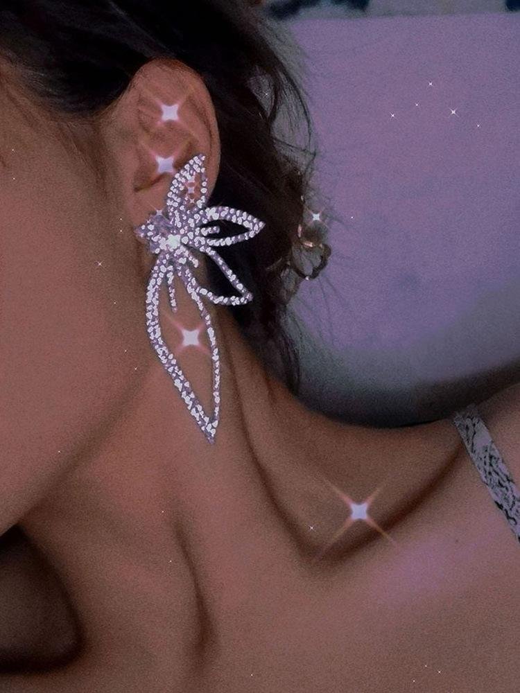 Exaggerated rhinestone butterfly dangler earrings