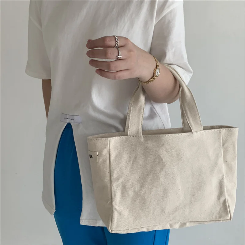 Mongw New Han Dai Same Style Egg Canvas Handbag Size Bento Bag Simple Leisure Portable Tote Bag