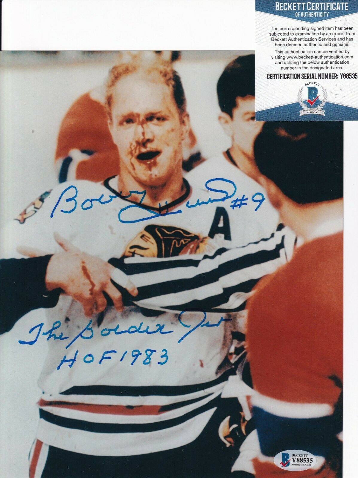 BOBBY HULL signed (CHICAGO BLACKHAWKS) Bloody 8X10 Photo Poster painting BECKETT BAS Y88535