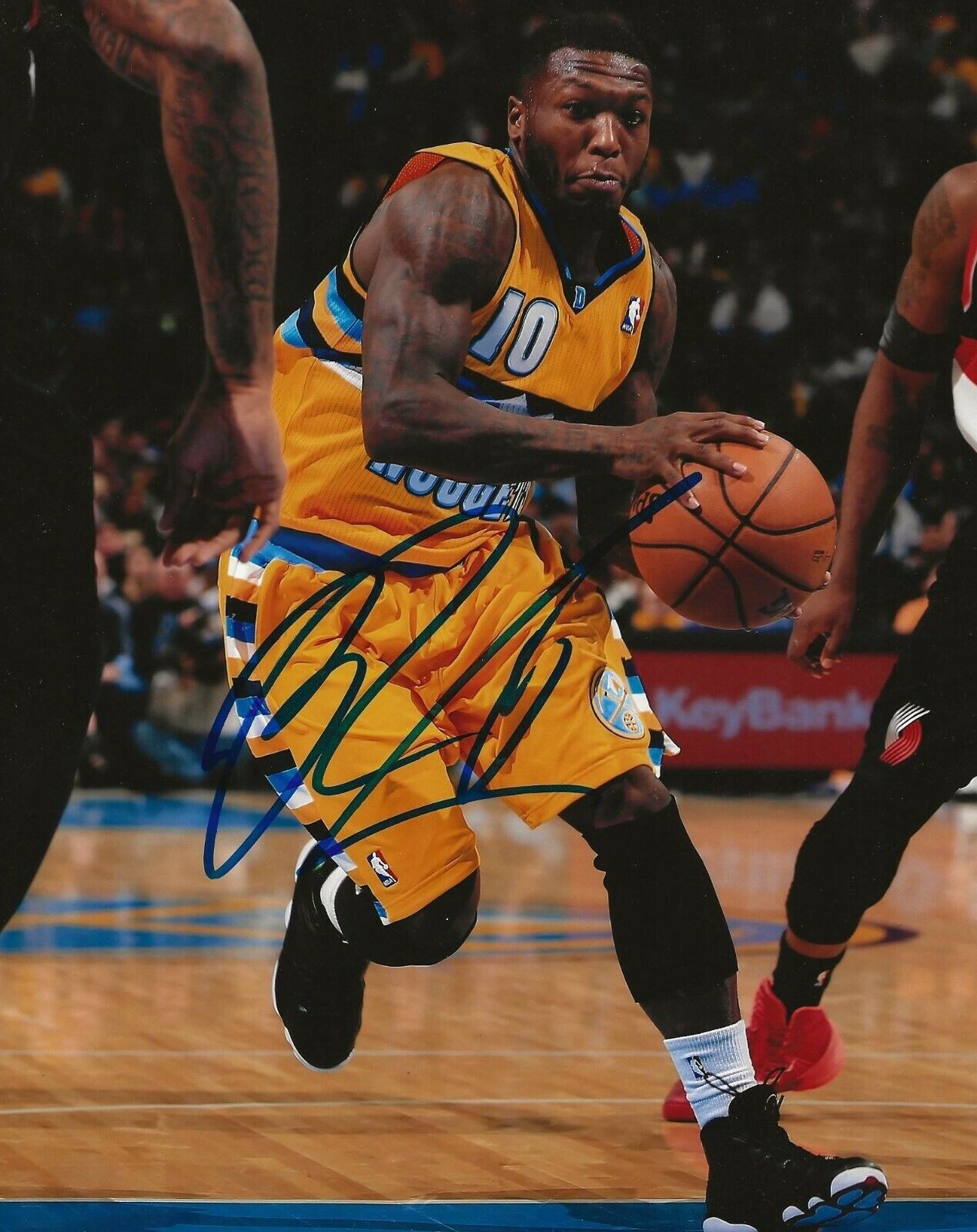 Nate Robinson signed Denver Nuggets 8x10 Photo Poster painting autographed