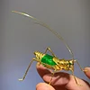 Handcrafted Gilded Grasshopper Art Piece: Materials and Craftsmanship
