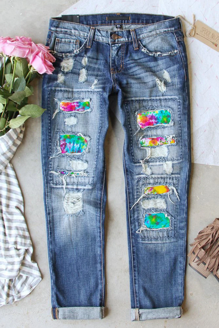 TIE DYE RIPPED JEANS