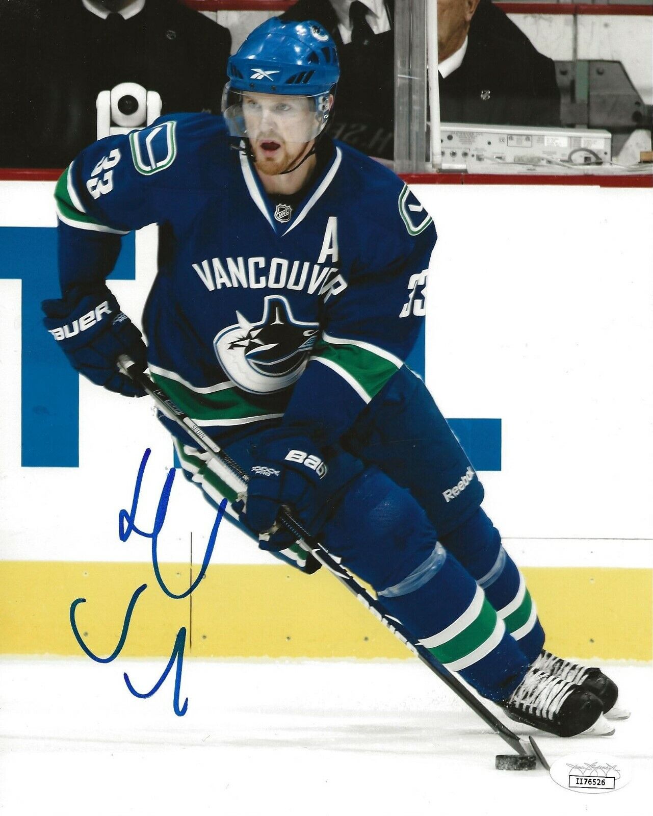 Henrik Sedin signed Vancouver Canucks 8x10 Photo Poster painting autographed JSA