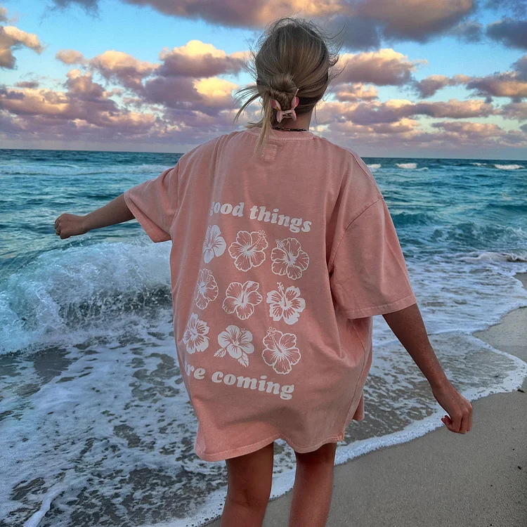 GOOD THINGS ARE COMING FLOWER TEE