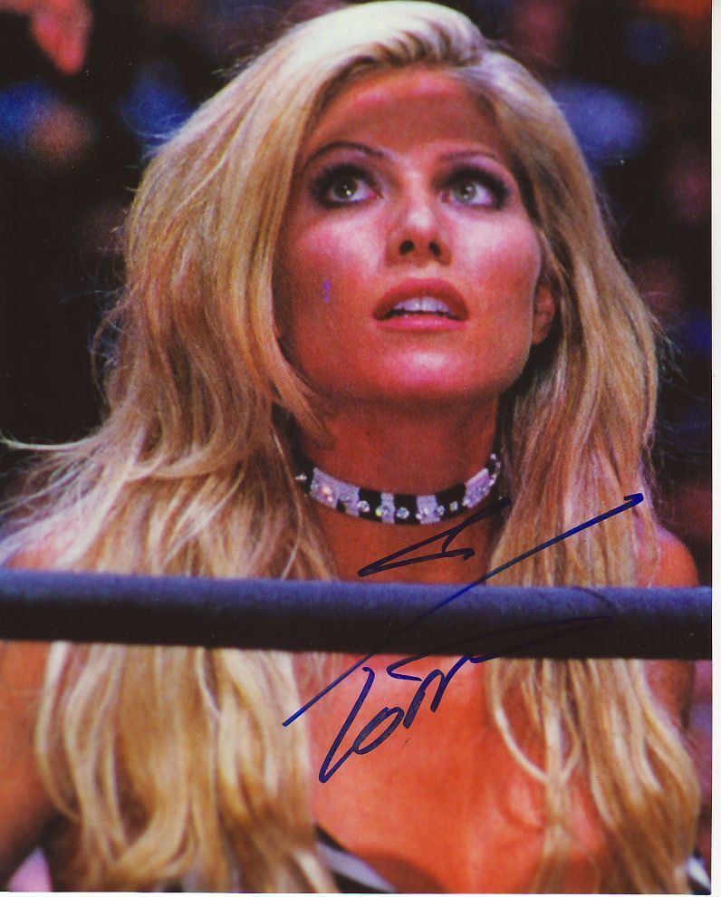WWE WWF TORRIE WILSON SEXY AUTOGRAPHED HAND SIGNED 8X10 Photo Poster painting PICTURE