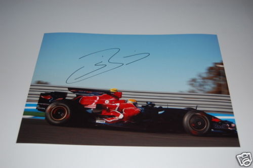 Toro Rosso F1 Photo Poster painting signed by Sebastien Buemi.