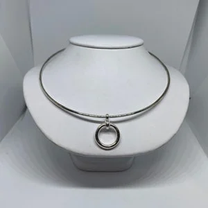 pornhint Pornhint Rigid slave collar in sterling silver.  Petite submissive day collar with Circle of O pendant with seamless collar design.