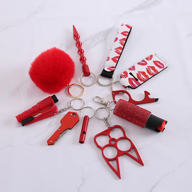 LIMITED BLING XO RED 16-in-1 Self Defense Keychain. FREEBIE SOS and LED Flashlight.