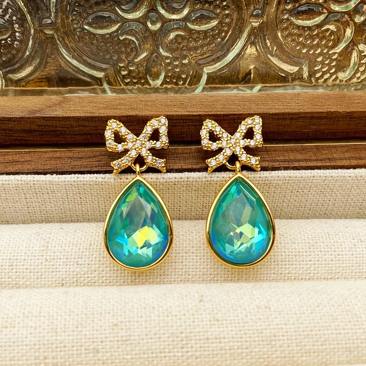Bow shaped water droplet tassel earrings