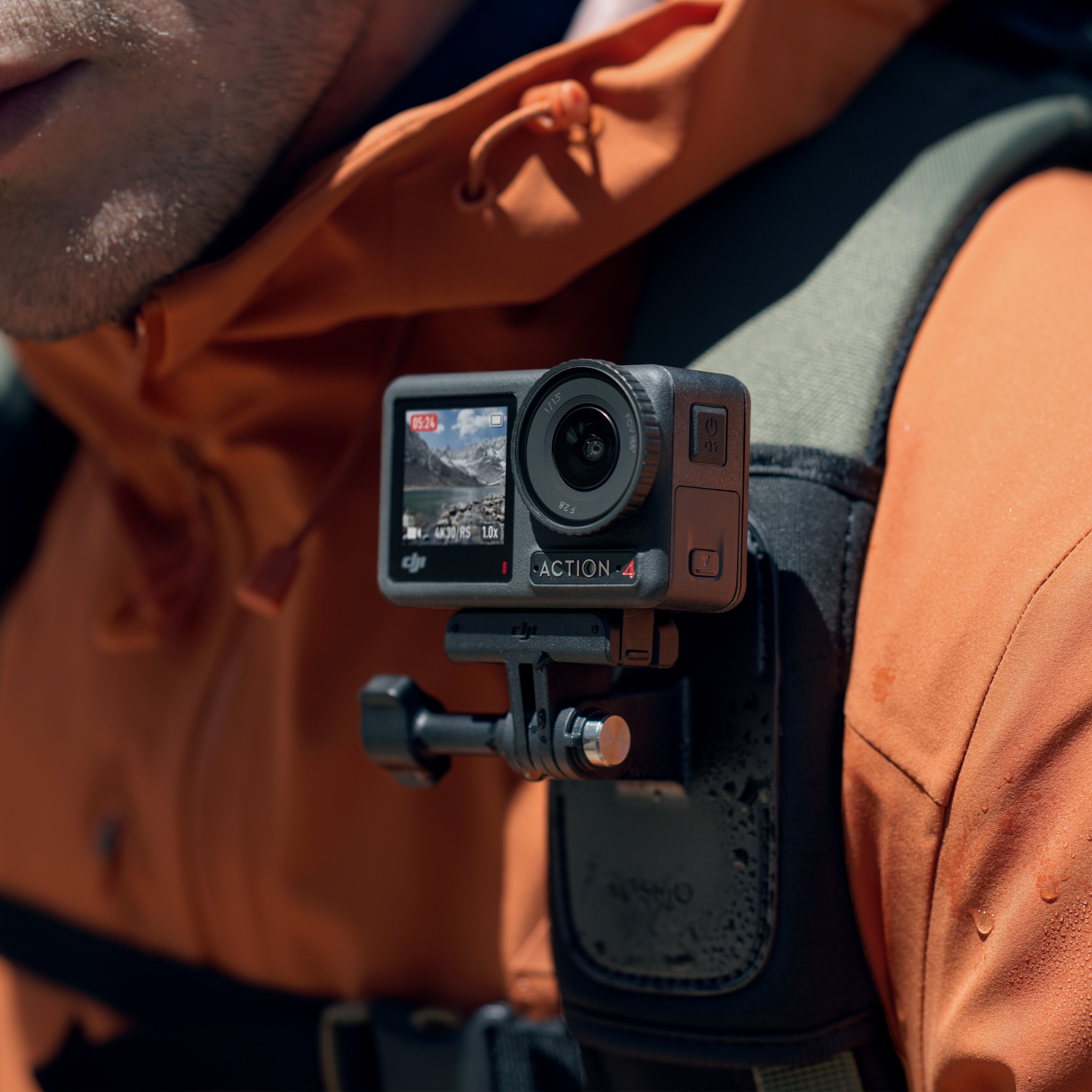 A man is using an Osmo Action 5 Pro to record his ride.