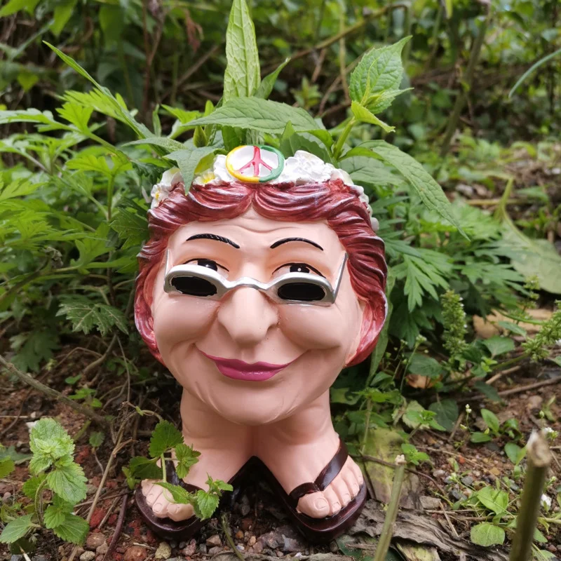 MUGGLY'S THE FACE STATUE PLANTER