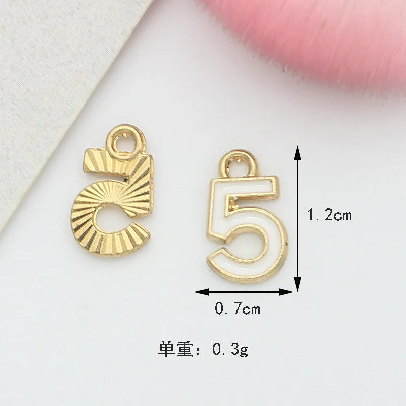 10 PCS/Package 1.5 * 20mm 14 * 14mm 7 * 12mm Alloy Rhinestones Pearl Number Heart Shape Bow Knot Polished Pendant