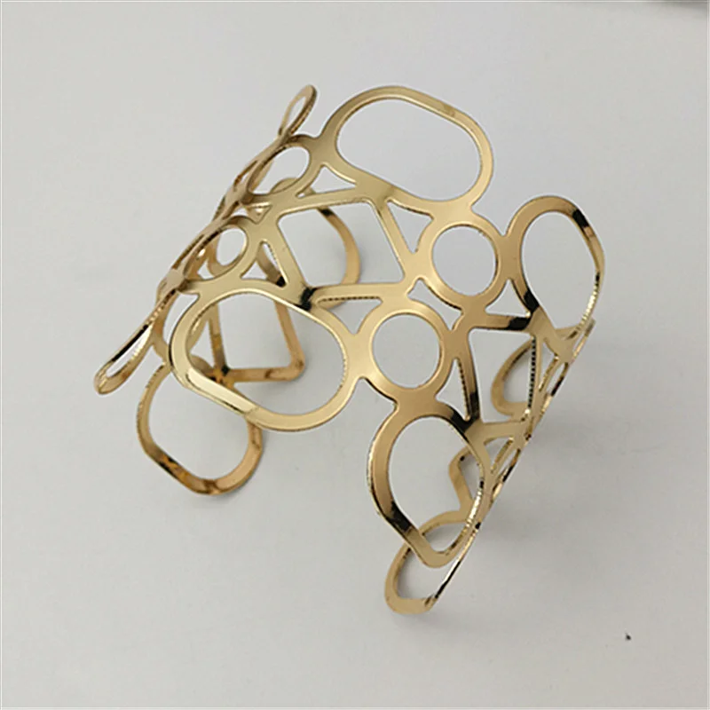 Gold-plated openwork metal wide-faced bracelet