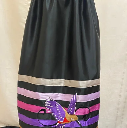 Ribbon Skirt: Chic skirt adorned with ribbons.