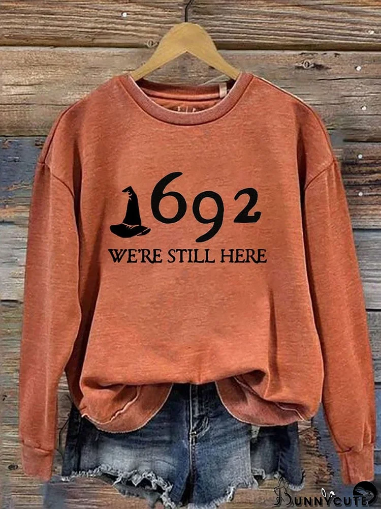 Women's 1692 Salem Witch "We're Still Here" Printed Round Neck Long Sleeve Sweatshirt