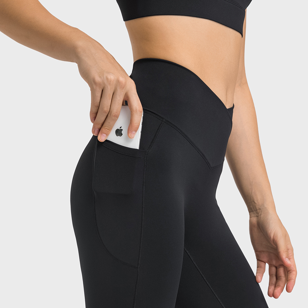 Shop no front seam high waist criss cross capri leggings with side pockets online on Hergymclothing Black