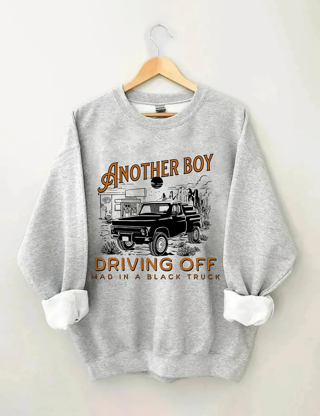 Boy Driving Off Mad Black Truck Sweatshirt