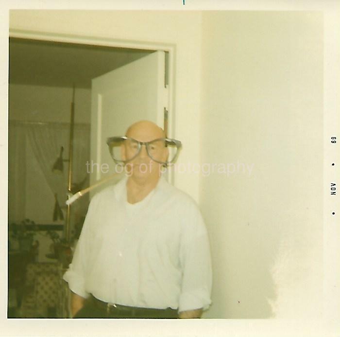 A Man With Extra Large Eyeglasses FOUND Photo Poster painting Color Snapshot VINTAGE 09 14 C