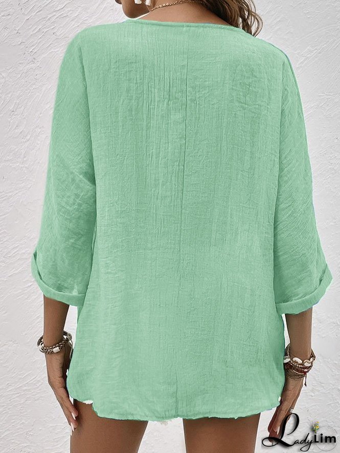 Blue linen V-neck shirt