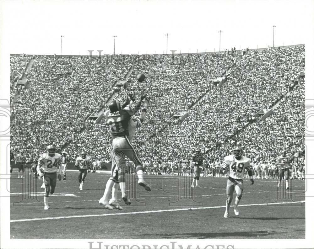 press Photo Poster painting Ron Jessie at play for Los Angeles Rams - RRQ68909