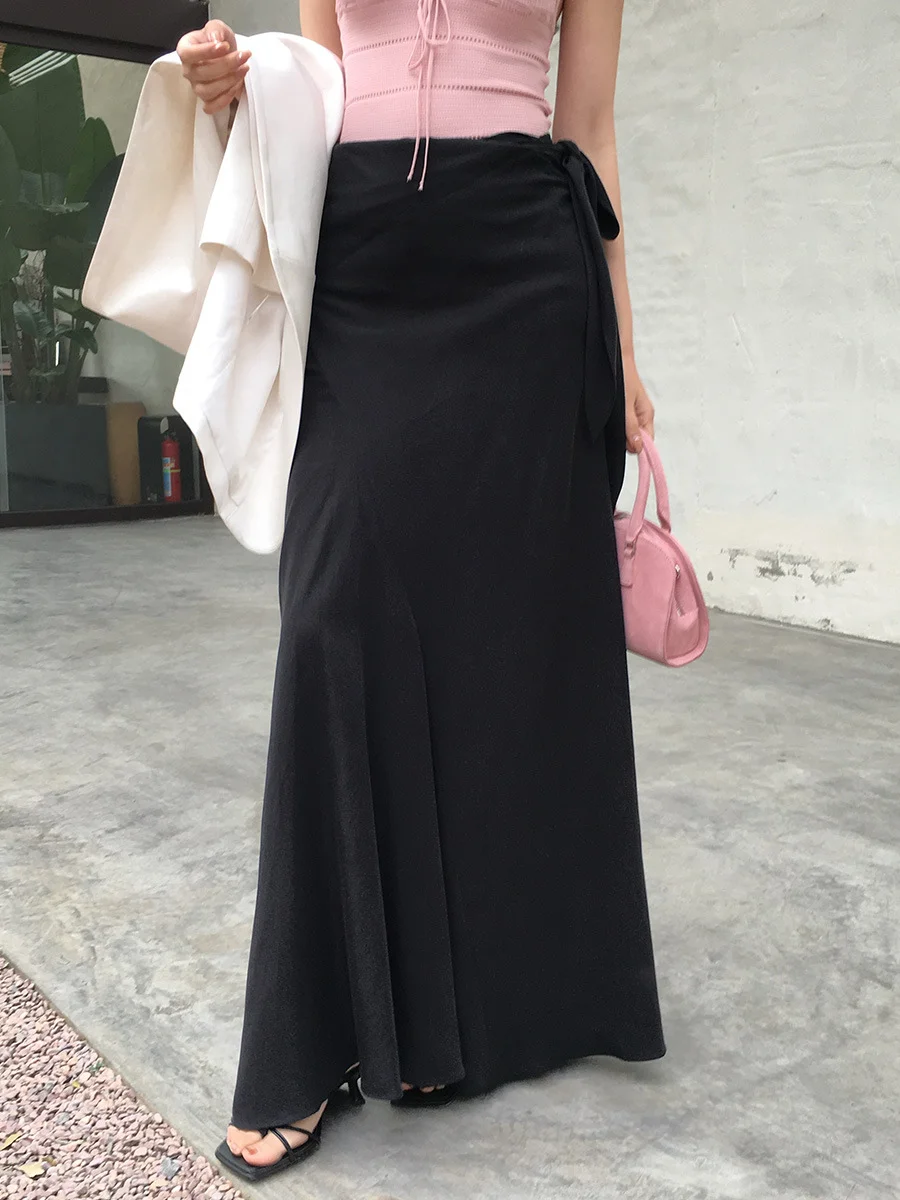 Brownm Brownm Xixi 2025 Spring New Temperament Commuting Solid Color Slim Waist Half-Body Skirt With Crooked Pencil Skirt 85111