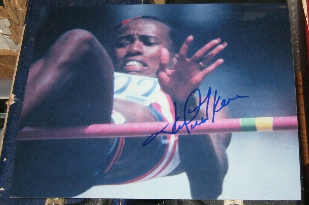 Jackie Joyner-Kersee Olympic Gold Medal High SIGNED AUTOGRAPHED 8x10 Photo Poster painting COA