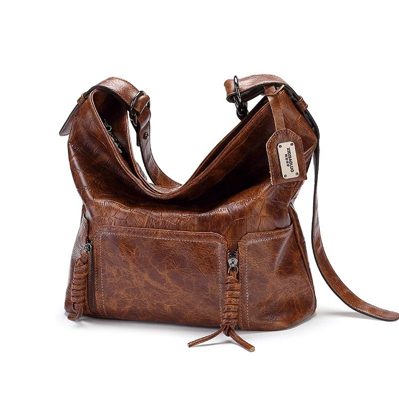 Vintage brand style single shoulder cross-arm capacity women's bag