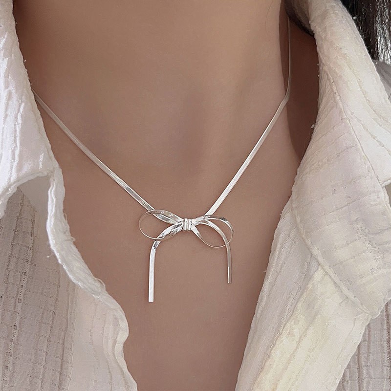 Full S925 sterling silver jewelry set: necklace, bracelet, and earrings.