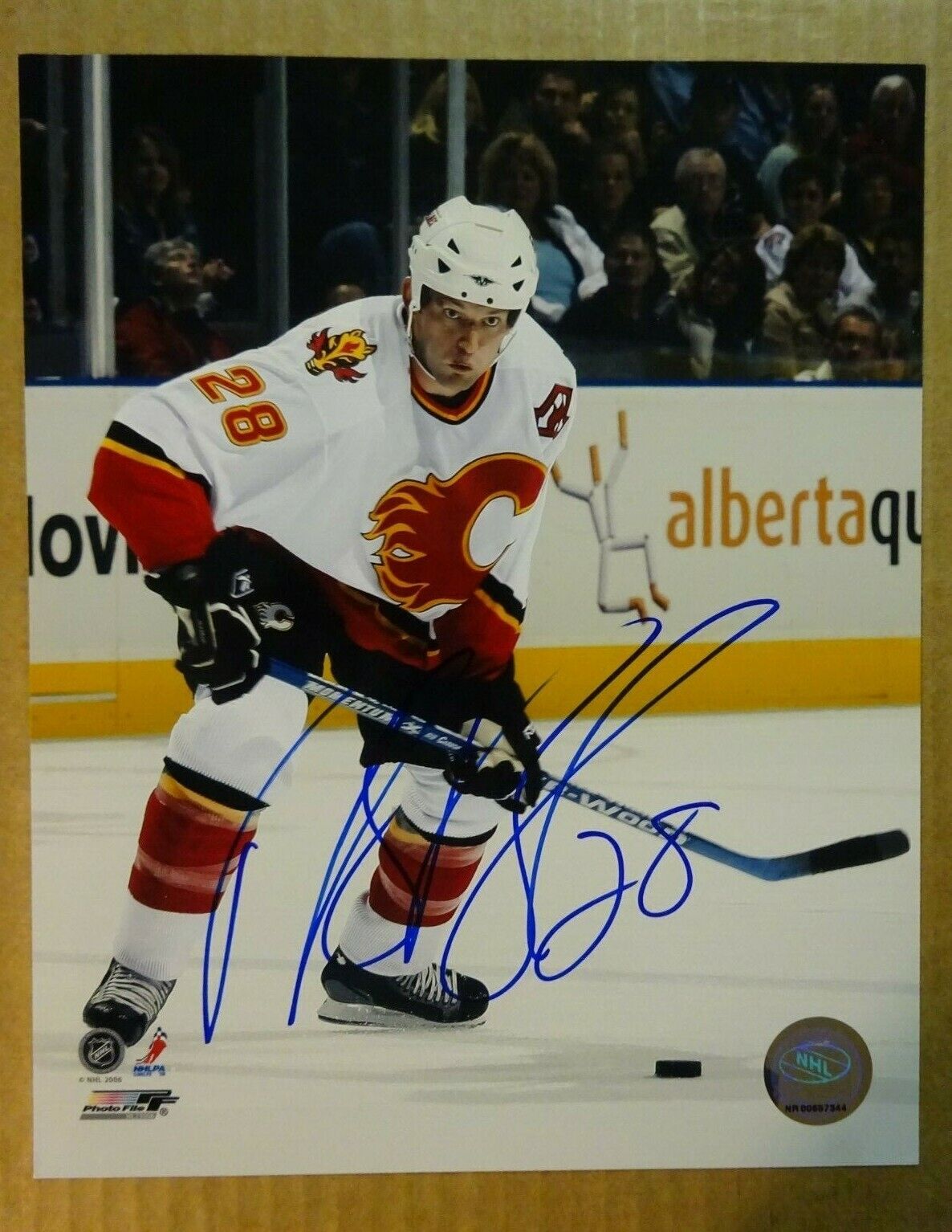 Autographed ROBYN REGEHR Signed Calgary Flames 8x10 Photo Poster painting File