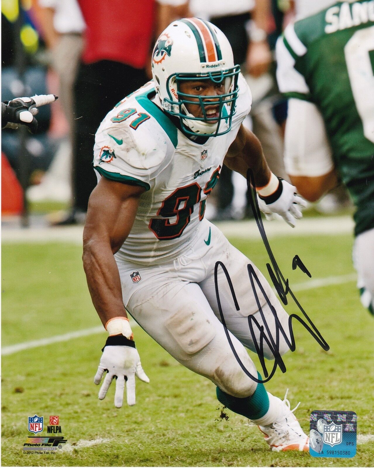 CAMERON WAKE MIAMI DOLPHINS ACTION SIGNED 8x10