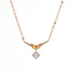 14K Rose Gold Wing Pendant Necklace with Round Lab Diamond in A Diamond-Cut Texture Halo