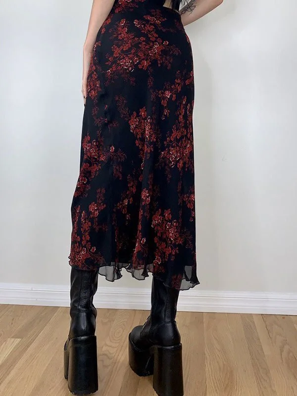 Brownm midi skirt with mesh inserts and floral pattern