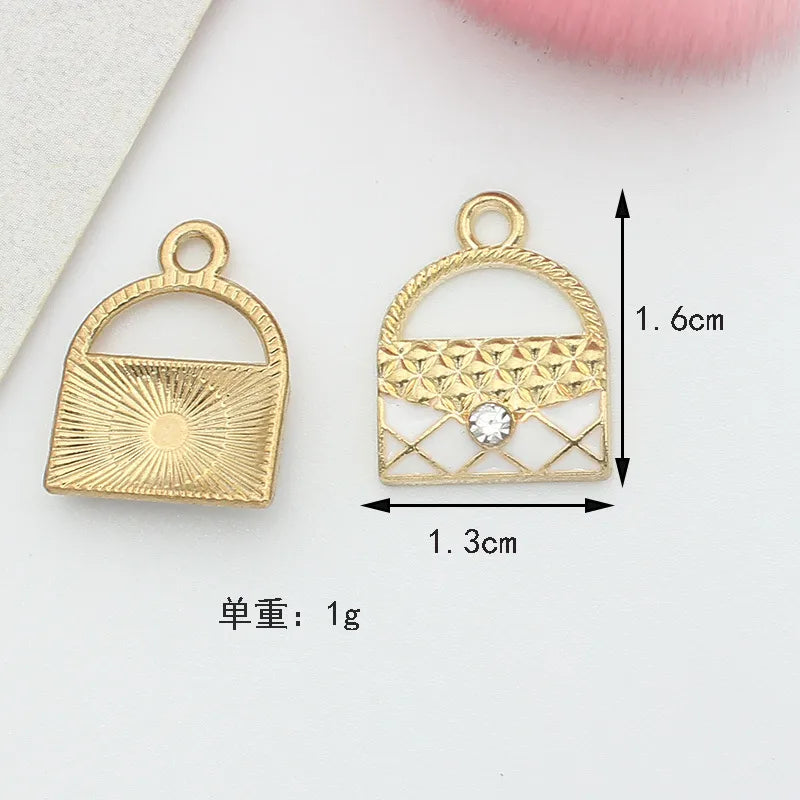 10 PCS/Package 1.5 * 20mm 14 * 14mm 7 * 12mm Alloy Rhinestones Pearl Number Heart Shape Bow Knot Polished Pendant