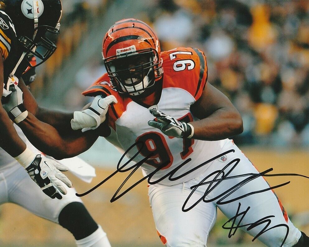 GENO ATKINS SIGNED CINCINNATI BENGALS FOOTBALL 8x10 Photo Poster painting #3 NFL AUTOGRAPH PROOF