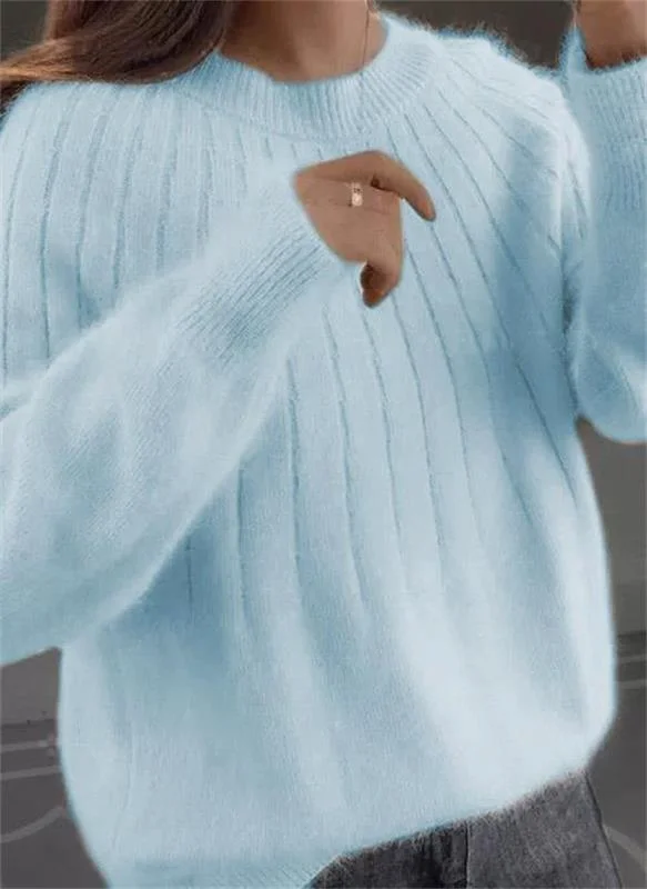 Suéter de punto de cachemira de color sólido y esponjoso