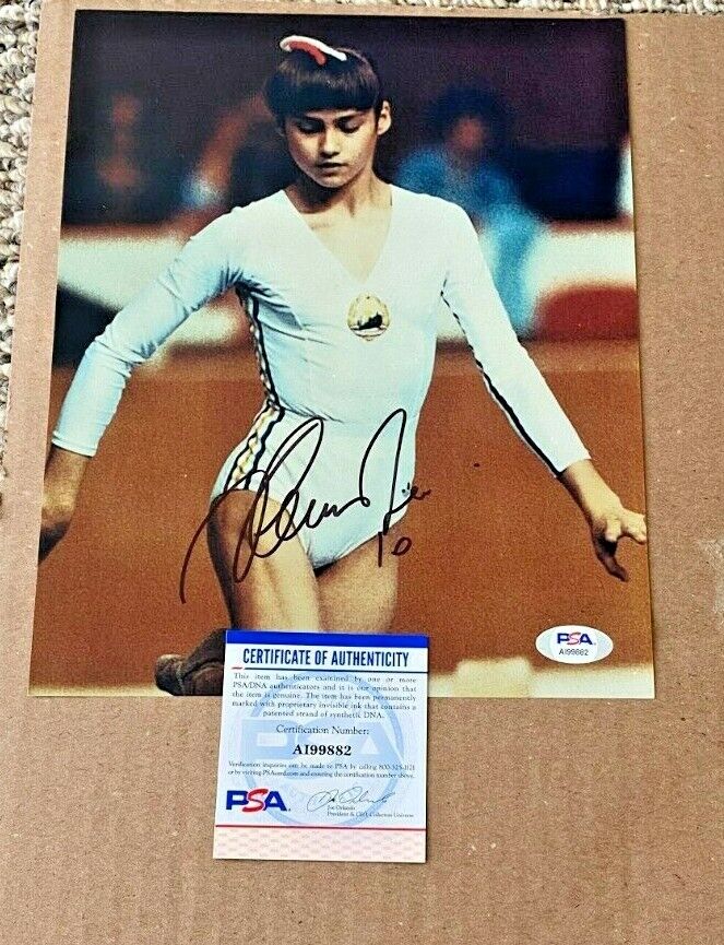 NADIA COMANECI SIGNED OLYMPICS GYMNASTICS 8X10 Photo Poster painting PSA/DNA