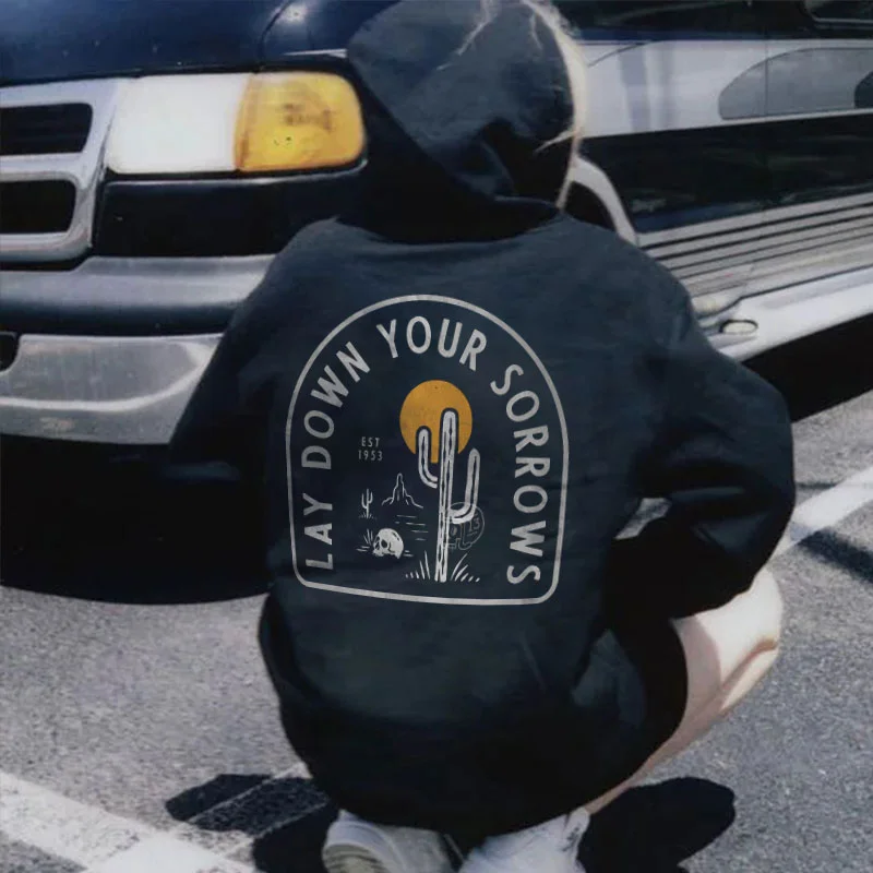 LAY DOWN YOUR SORROWS Skull Desert Cactus  Black Print Hoodie