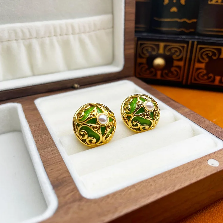 Hollow hemispherical pearl resin earrings