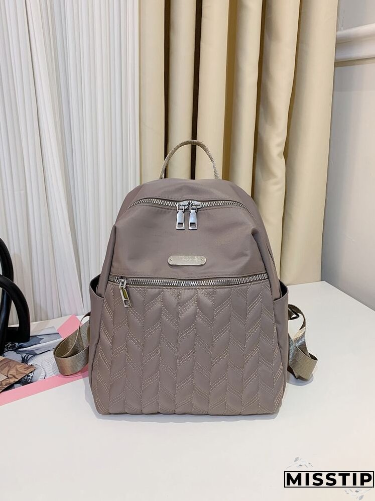 Metal Decor Quilted Backpack