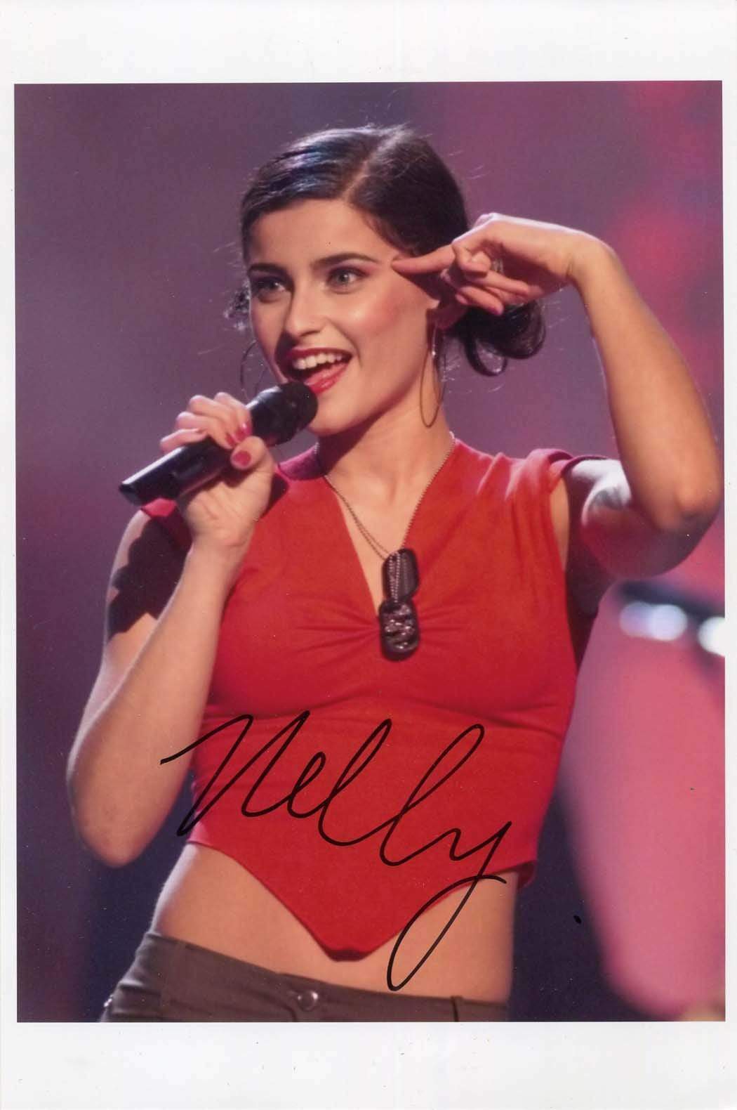 Nelly Furtado SINGER & SONGWRITER autograph, In-Person signed Photo Poster painting