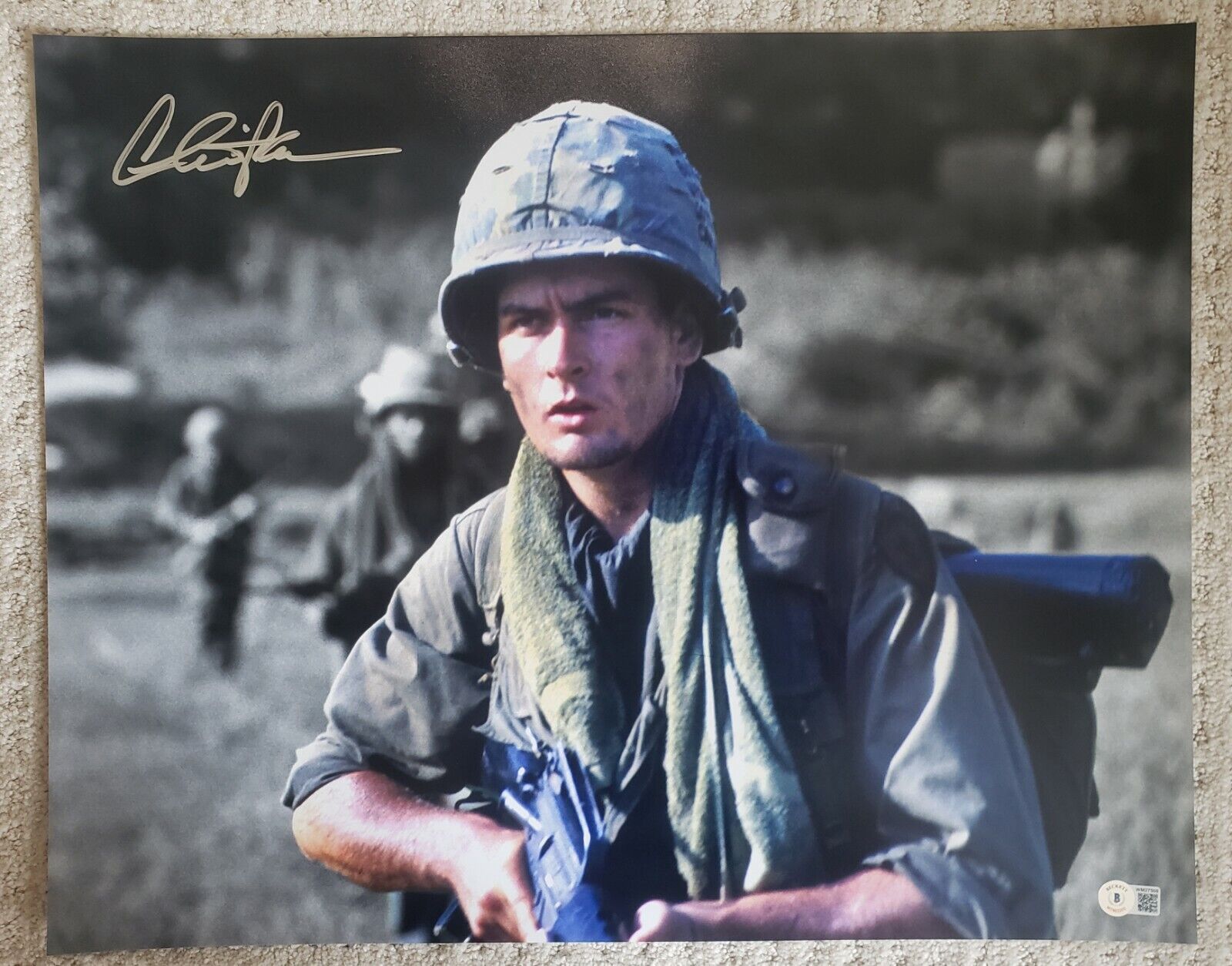 16x20 Spotlight Autographed by Charlie Sheen in Platoon. BAS Beckett