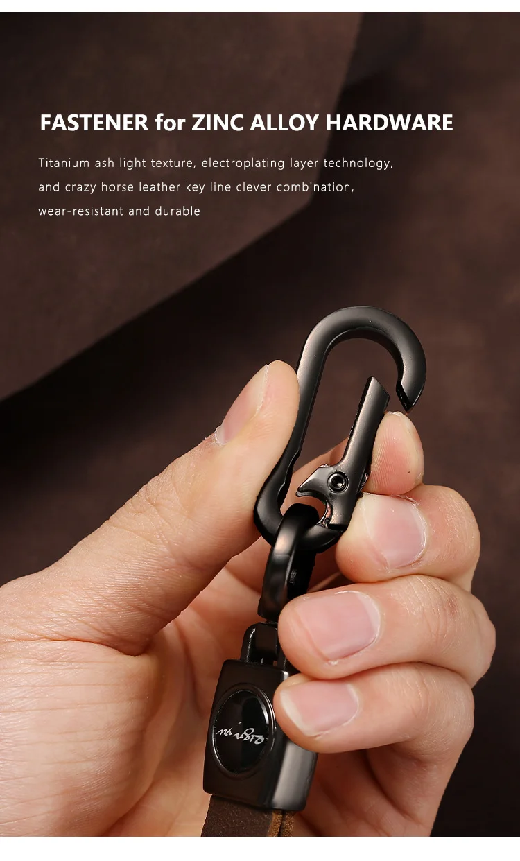 🔥Hot sale🔥Exclusive logo🔥Car anti-lost genuine leather alloy keychain