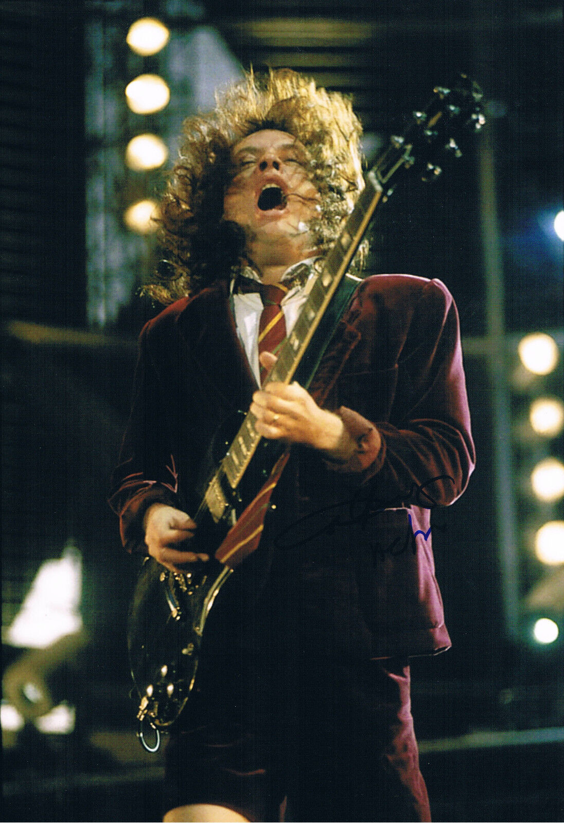 AC/DC Angus Young 1955- genuine autograph Photo Poster painting 8x12