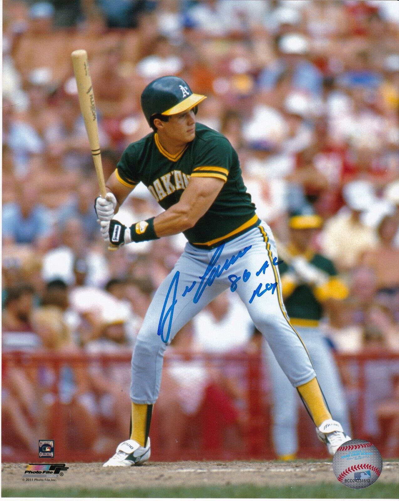 JOSE CANSECO OAKLAND A'S 1986 AL ROY ACTION SIGNED 8x10