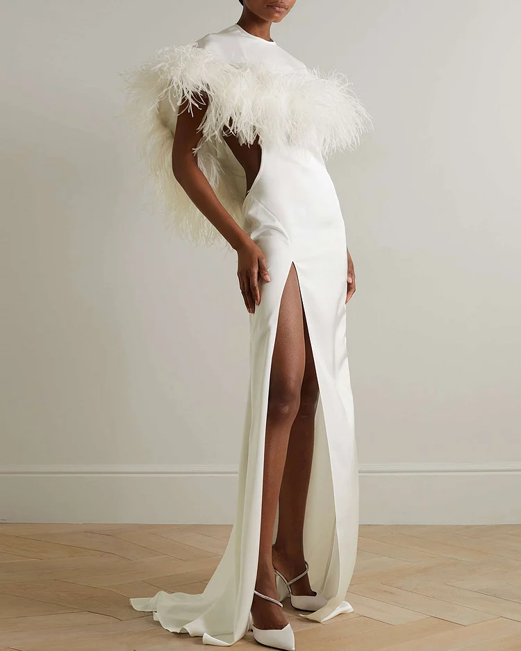 Cape-effect feather-trimmed cutout satin gown