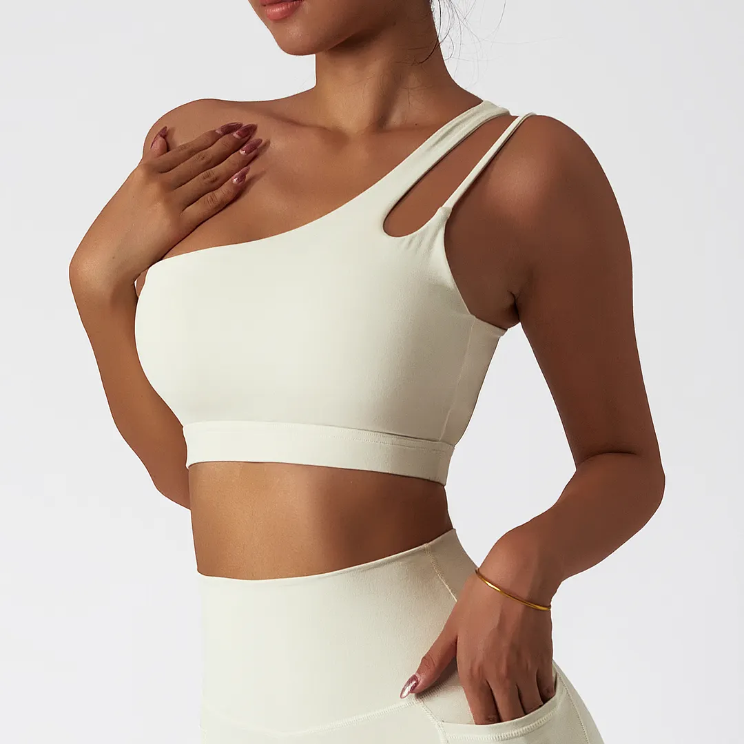 Buy Hergymclothing Cream Apricot oblique single shoulder anti slip open back running gym fitness sports bra online